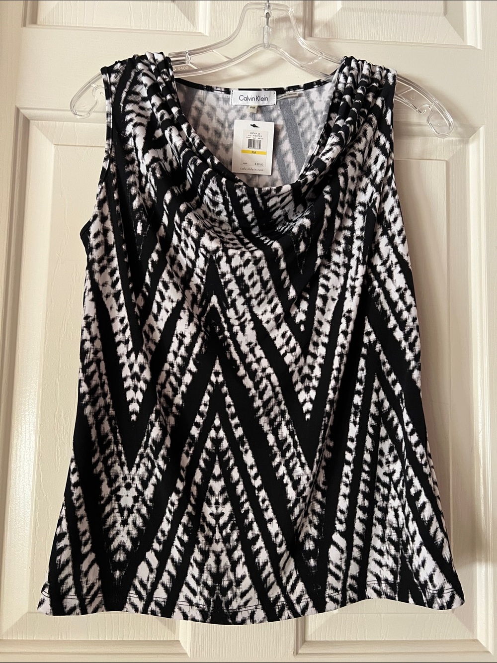 Calvin klein blouse / tops ( NWT)
  Loose / flowy fit
